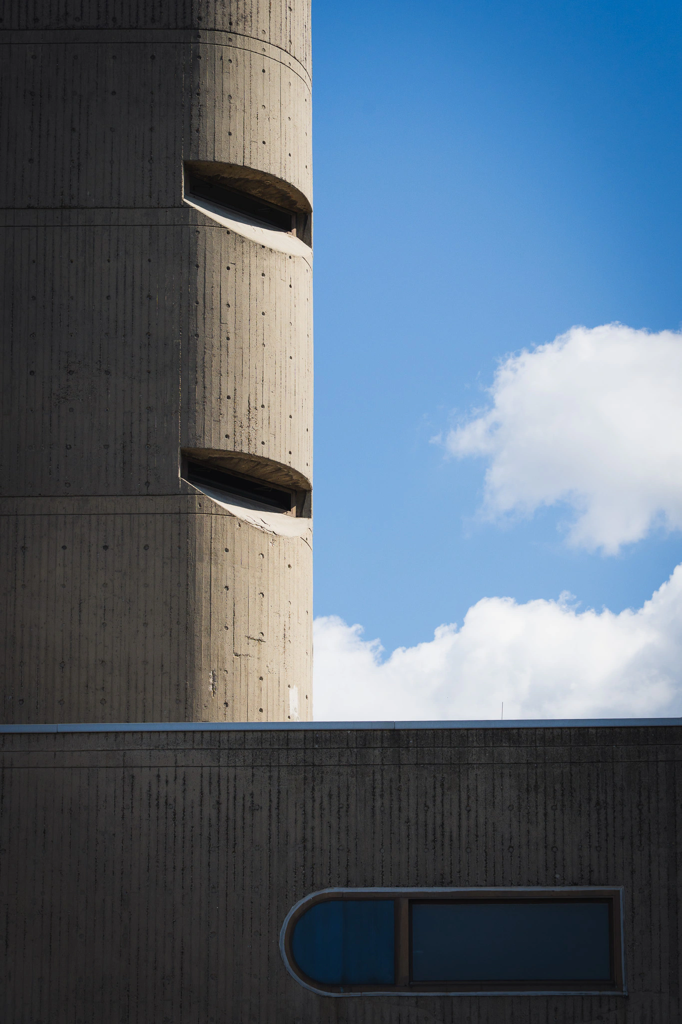 Concrete tower of the former Institute of Hygiene with curved window hoods